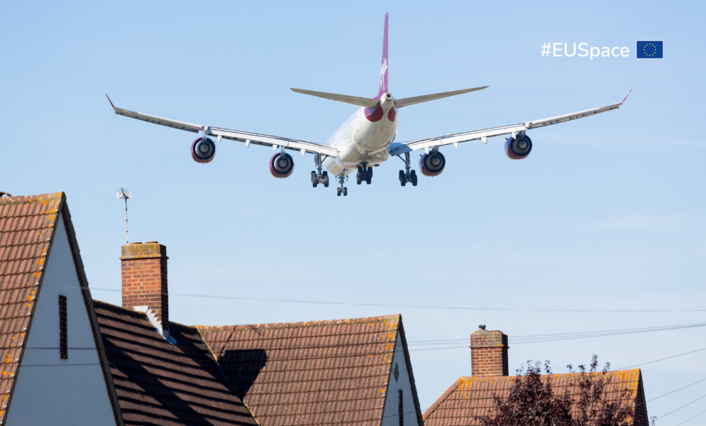 Airplane landing with blue sky background